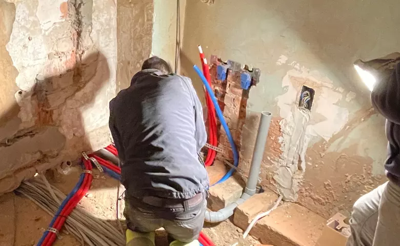 Plumber Working at Site